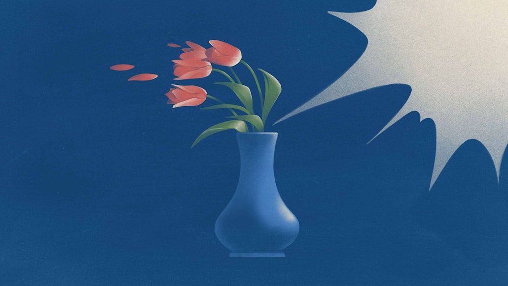 Symbolising violence against women, tulips in a vase are blown to the side by a violent blast of air.